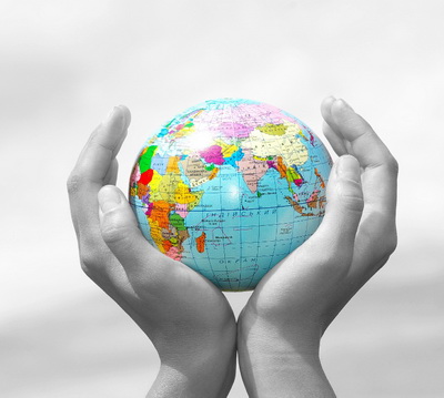 Hands holding a globe